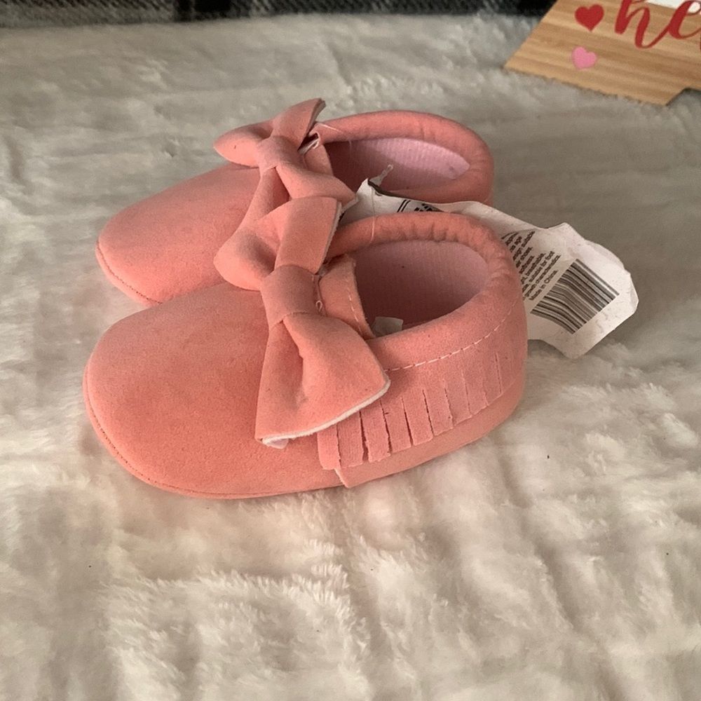 Light pink baby moccasins